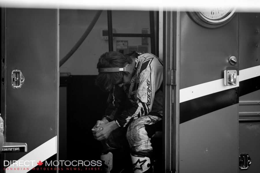 Redemption Racing Fly Dragon KTM's #92 Cade Clason in the zone before a moto. I bet that's country he's listening to. 